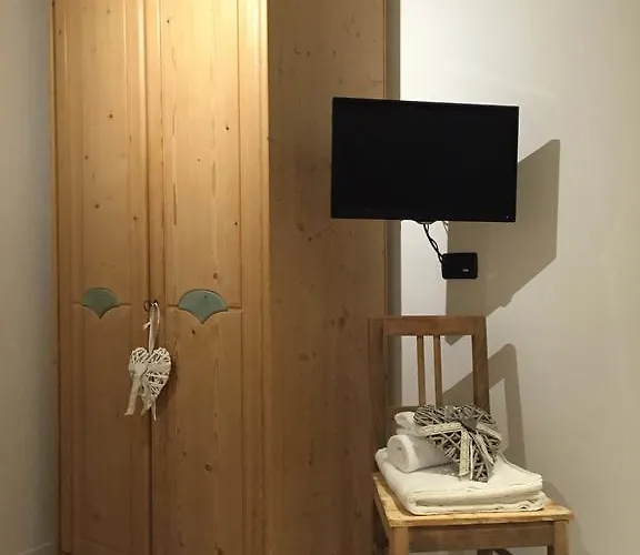 לינה וארוחת בוקר Rosso Pila 3*